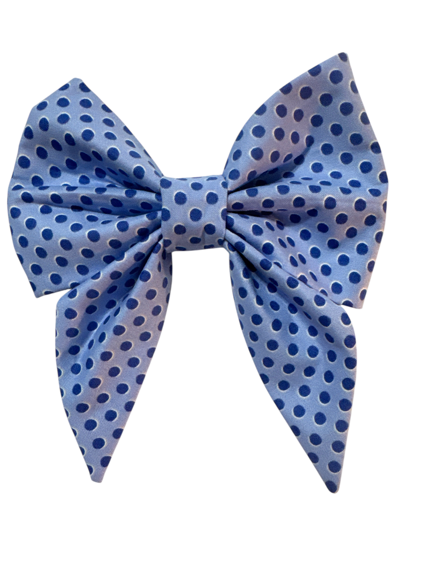 soft grey-blue fabric adorned with medium-sized polka dots in a complementary medium blue