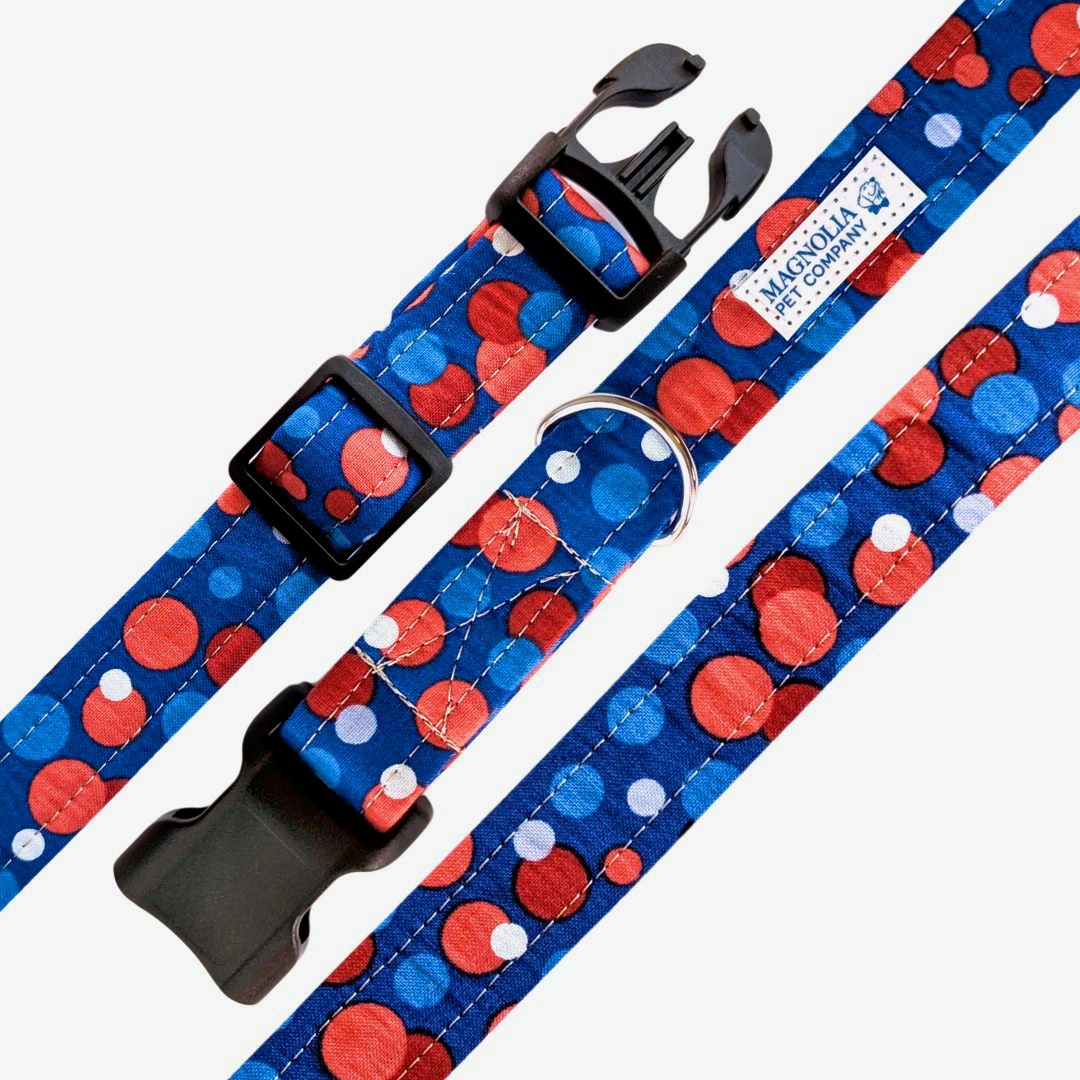 Featuring large red, white and blue polka dots on a vibrant blue background