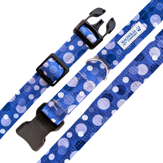 &nbsp;Featuring large, classic polka dots, this sophisticated accessory adds a pop of color and charm to any outfit. &nbsp;Its timeless design and soft blue hue makes it the perfect choice for both casual and special occasions.