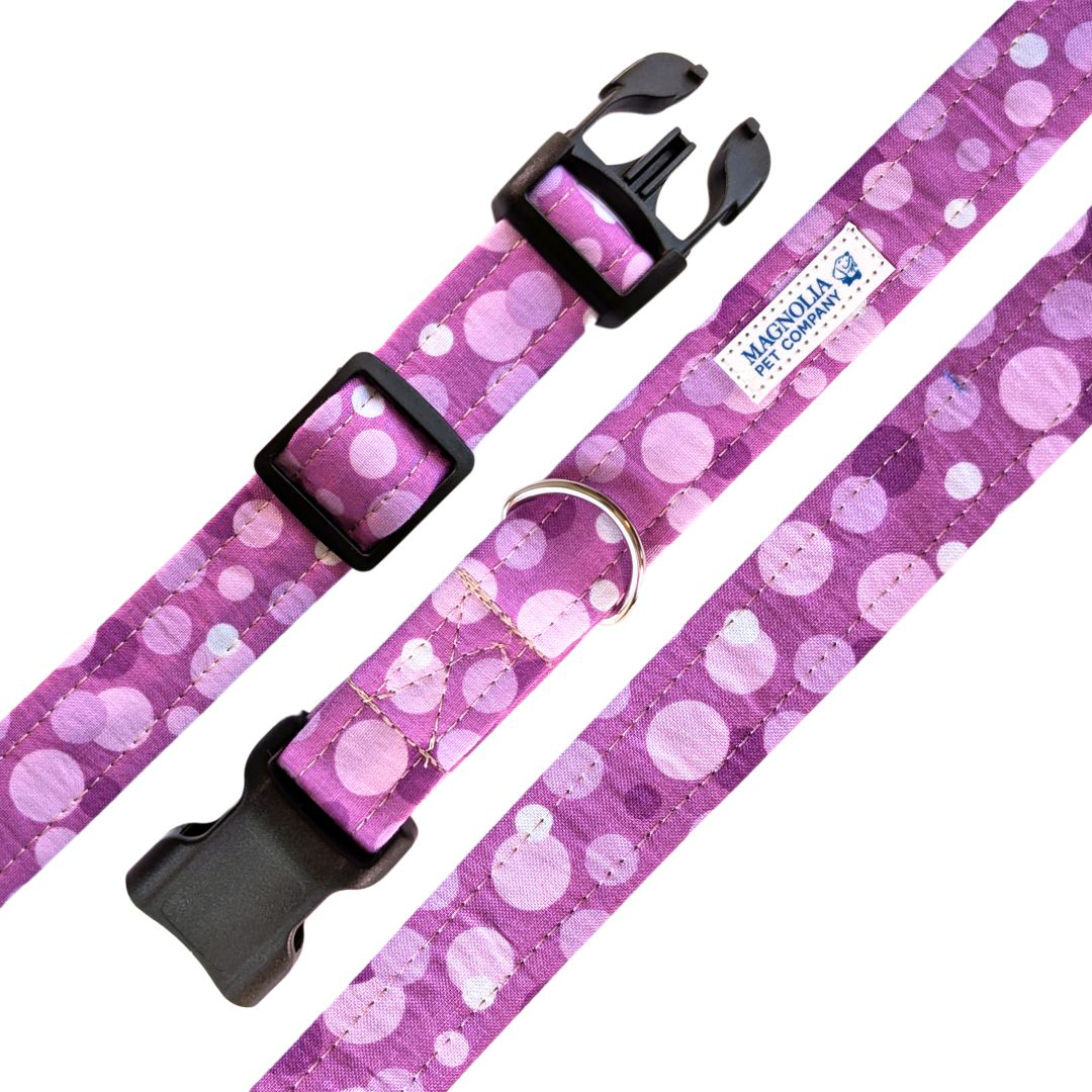 large, vibrant polka dots in a delightful mix of purple and lavender shades.