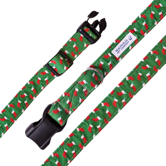 charming green dog collar, featuring a festive pattern of red and white Christmas stockings