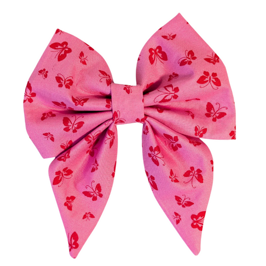 vibrant bright pink fabric adorned with playful hot pink petite butterflies