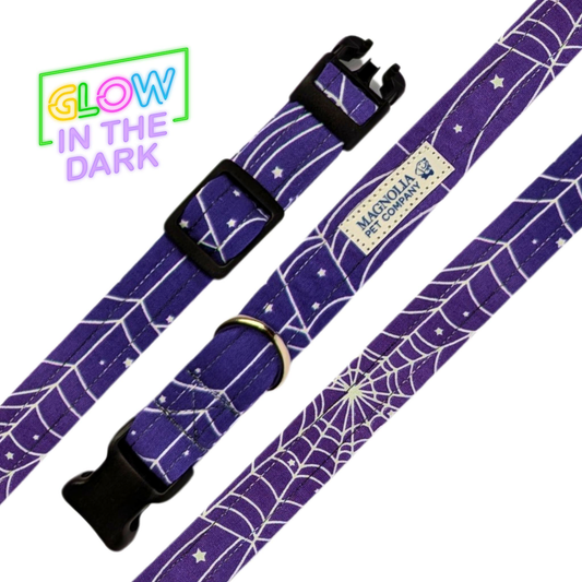 Crafted from high-quality, durable purple fabric, this collar features an intricate pattern of white webs that glows in the dark