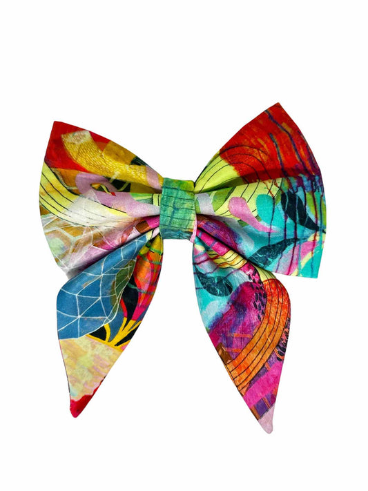 This unique accessory is a dazzling kaleidoscope of pinks, reds, blues, yellows, and greens, designed to make your furry friend stand out in any crowd. Each bow features a one-of-a-kind swirl pattern, ensuring that no two bows are ever alike, making your pet's accessory as unique as they are