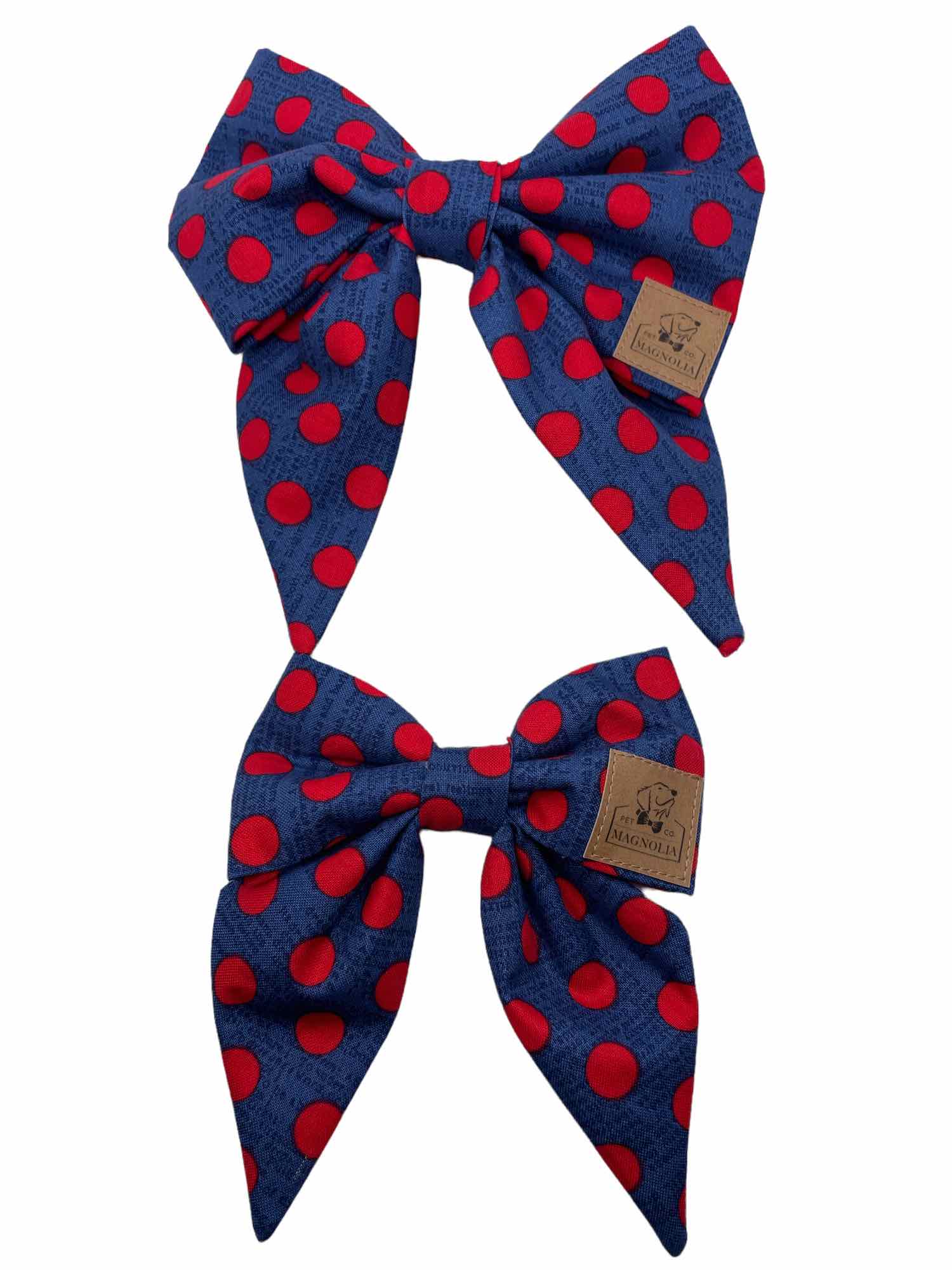 Elevate your dog's style with our exquisite Dark Navy Polka Dot Dog Bow, adorned with bold, large red polka dots. Handmade in the USA.