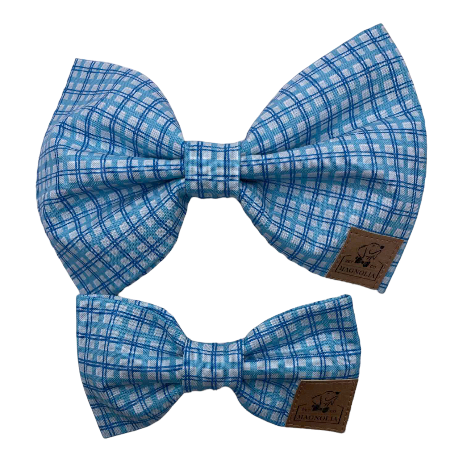 This dog bow tie features a fresh, crisp white background with a two-tone blue plaid design, perfect for celebrations or everyday. Handmade in the USA.